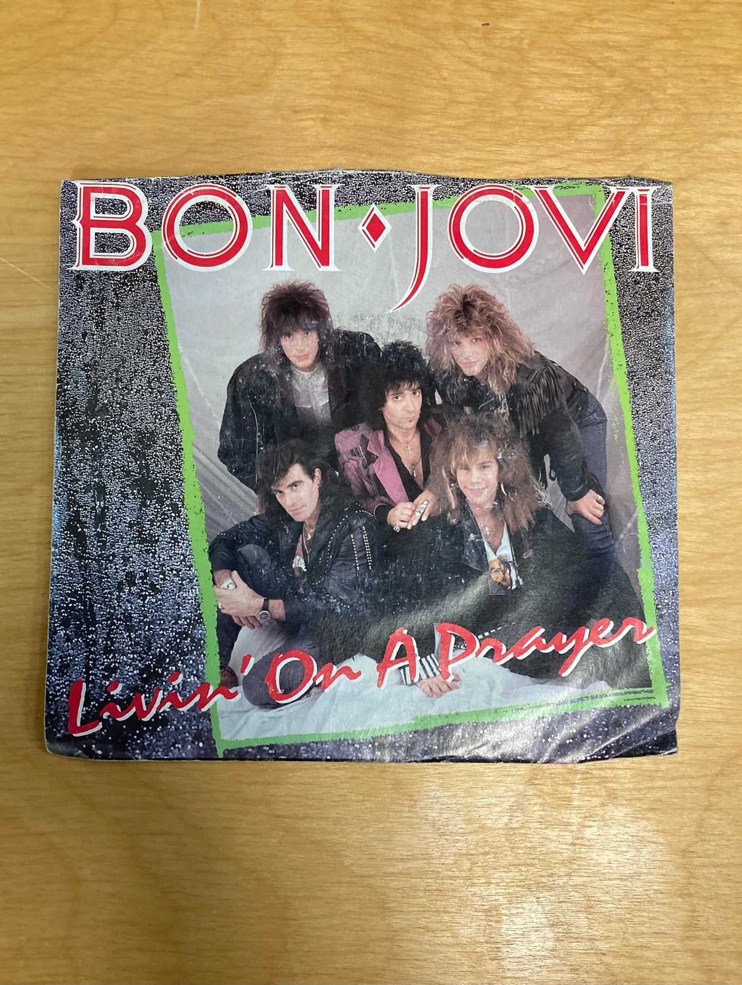 Viviendo en una oración / Salvaje en las calles - Bon Jovi